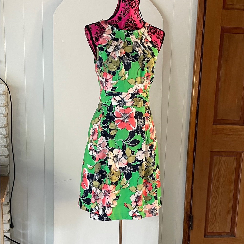 Vibrant Floral Midi Dress in Green by [Brand]